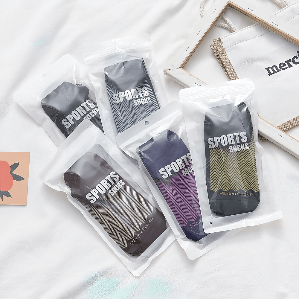 Women's non-slip breathable Pilates socks in various colors, packaged and ready for yoga, ballet, or fitness. Style SF1385.